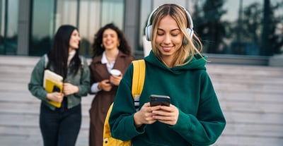 college-student-on-phone-campus-admissions-ai-agent-druid-ai