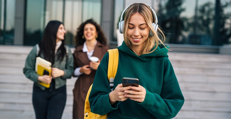 college-student-on-phone-campus-admissions-ai-agent-druid-ai