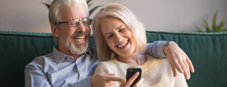 couple interacting with AI agent over mobile phone