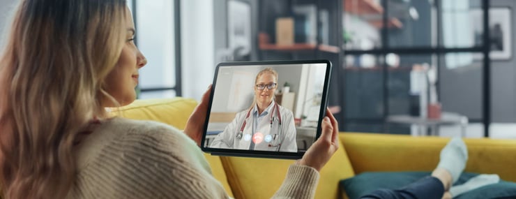 healthcare-patient-having-online-consultation-with-healthcare-professional-on-handheld-device