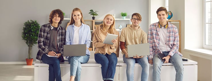 students-with-laptops-on-their-laps-interacting-with-university-education-ai-agents