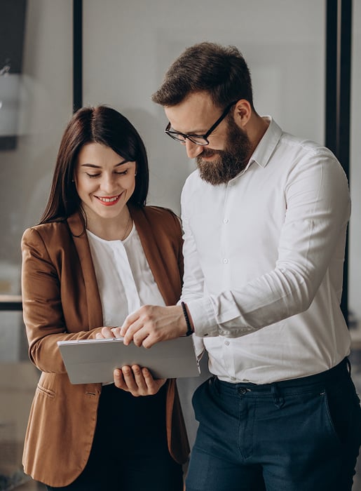 two-business-partners-working-office 2