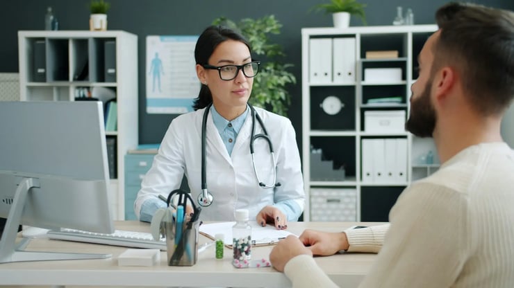 Doctor discussing with a patient during an appointment
