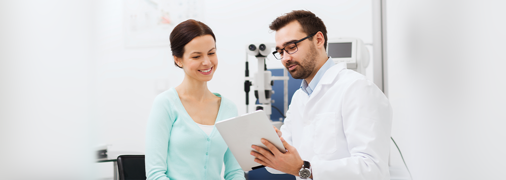 woman and doctor discussing tablet conversational AI automation